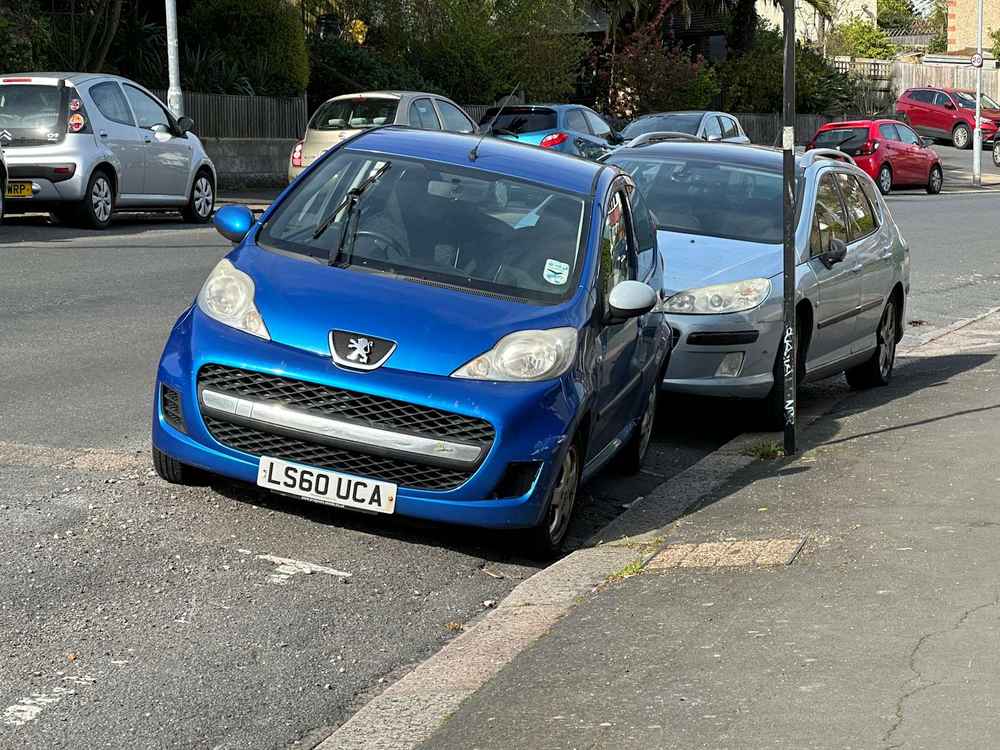 Photograph of LS60 UCA - a Blue Peugeot 107 parked in Hollingdean by a non-resident. The ninth of thirty photographs supplied by the residents of Hollingdean.