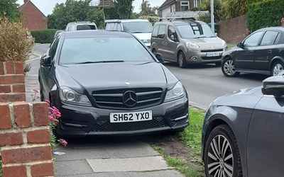 SH62 YXO, a Black Mercedes C Class parked in Hollingdean
