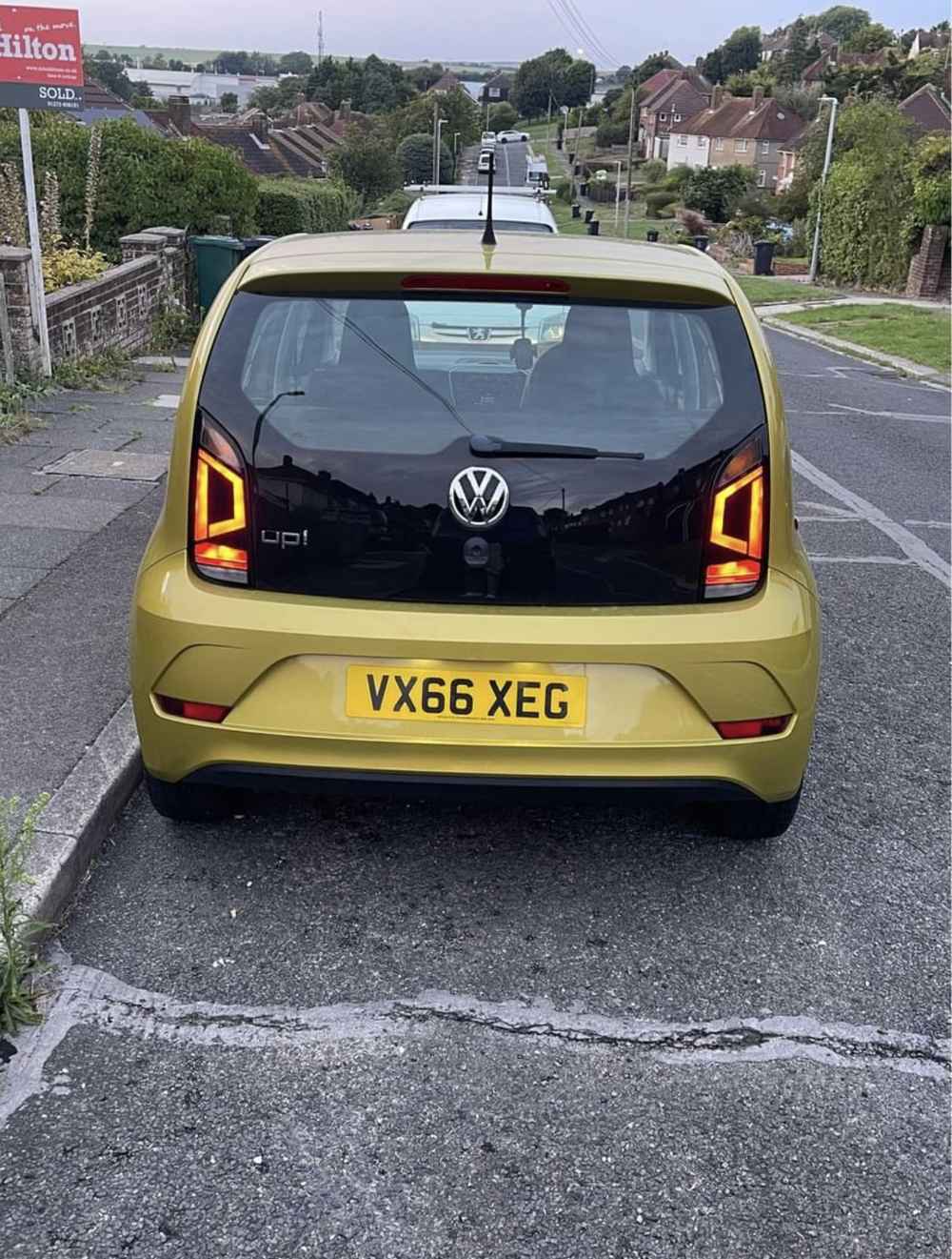 Photograph of VX66 XEG - a Gold Volkswagen Up parked in Hollingdean by a non-resident and stored here whilst a dodgy car dealer attempts to sell it. The third of four photographs supplied by the residents of Hollingdean.