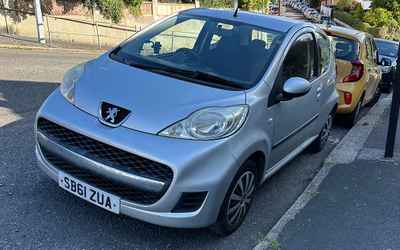 SB61 ZUA, a Silver Peugeot 107 parked in Hollingdean