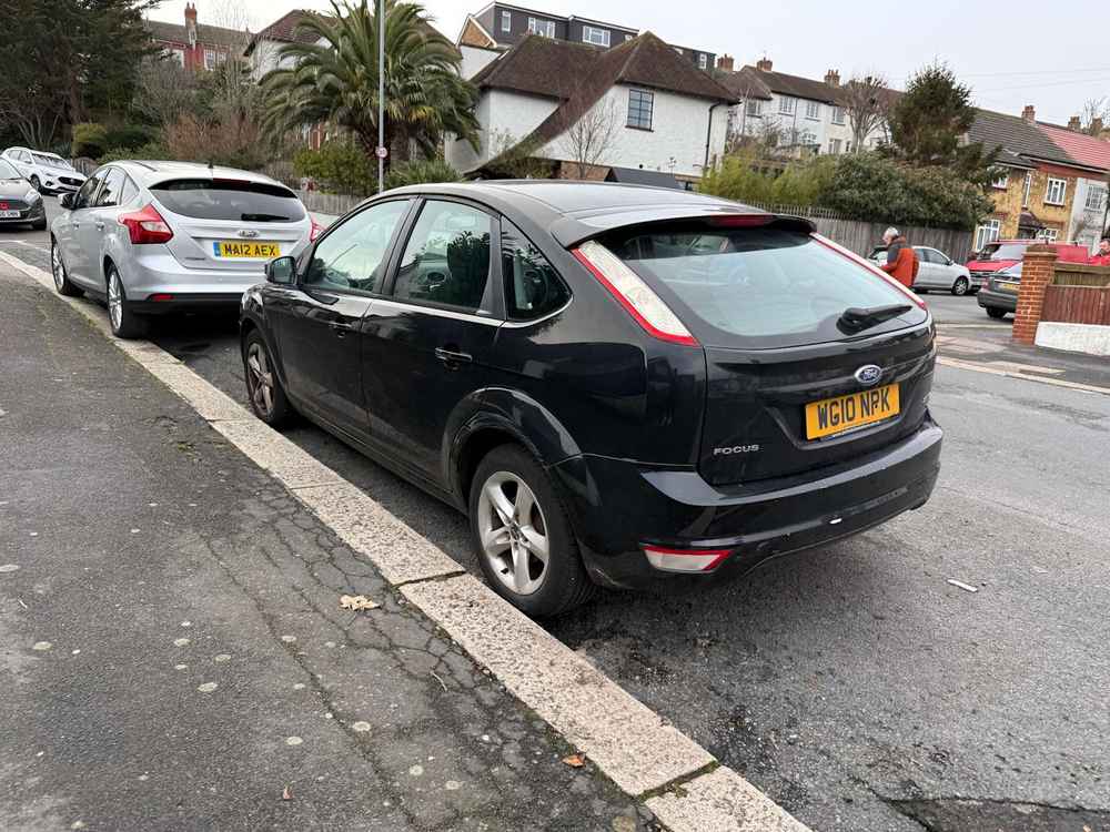 Photograph of WG10 NPK - a Black Ford Focus parked in Hollingdean by a non-resident. The eighteenth of eighteen photographs supplied by the residents of Hollingdean.