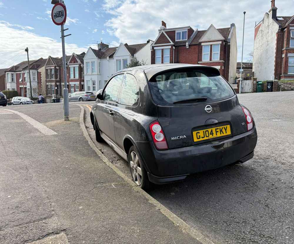 Photograph of GJ04 FKY - a Black Nissan Micra parked in Hollingdean by a non-resident. The fifth of six photographs supplied by the residents of Hollingdean.