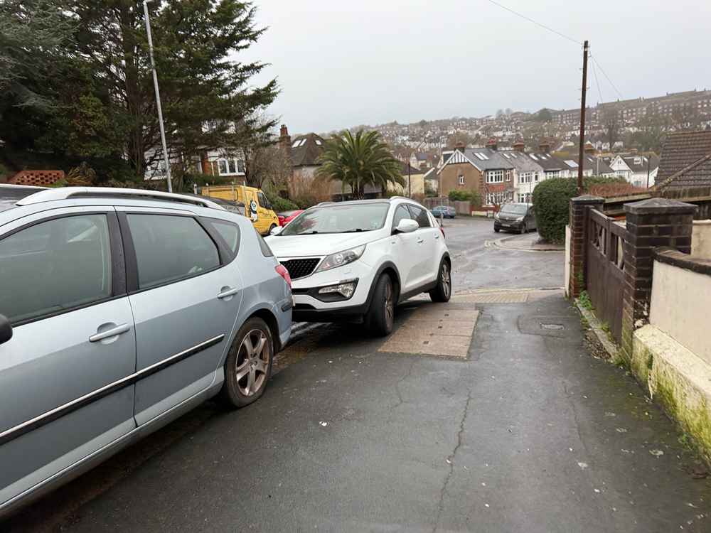 Photograph of GY15 TXS - a White Kia Sportage parked in Hollingdean by a non-resident. The third of five photographs supplied by the residents of Hollingdean.