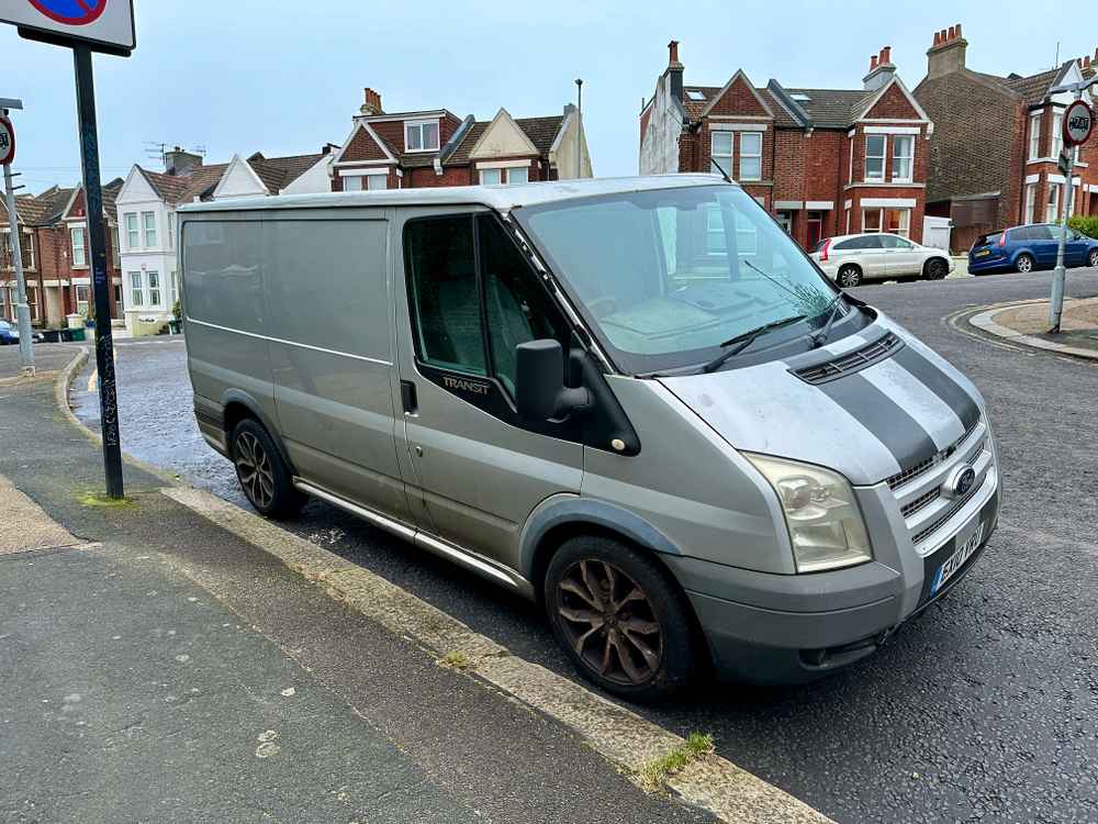 Photograph of EX10 VRU - a Silver Ford Transit parked in Hollingdean by a non-resident. The tenth of sixteen photographs supplied by the residents of Hollingdean.