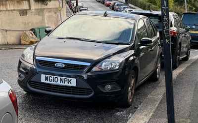 WG10 NPK, a Black Ford Focus parked in Hollingdean