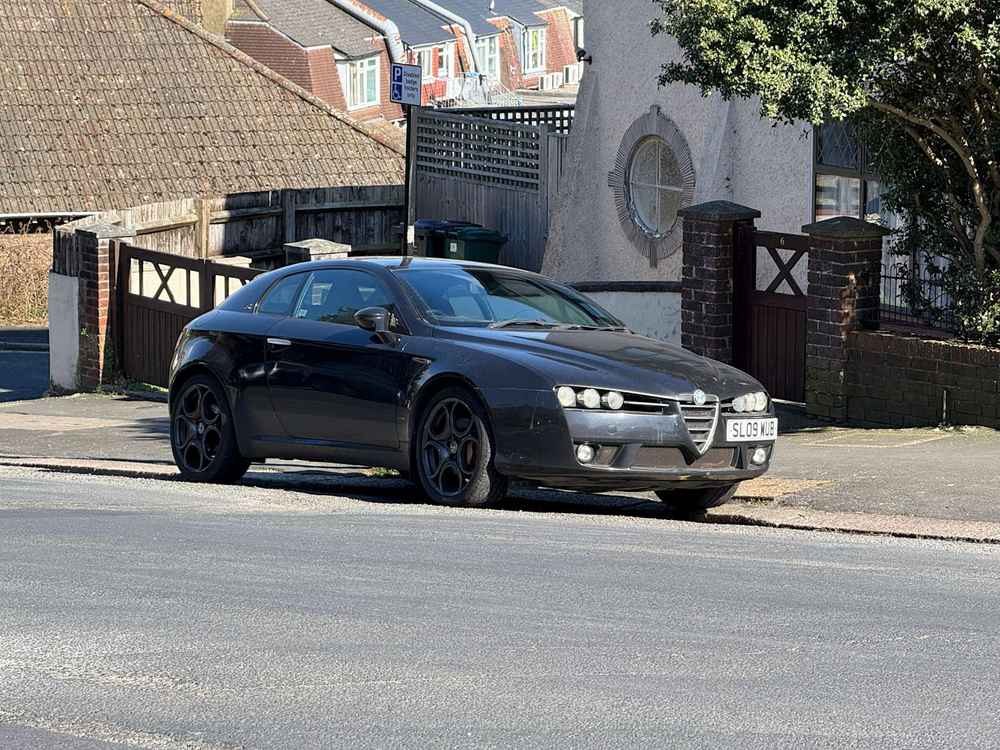 Photograph of SL09 WUB - a Black Alfa Romeo Brera parked in Hollingdean by a non-resident. The twenty-ninth of forty-four photographs supplied by the residents of Hollingdean.