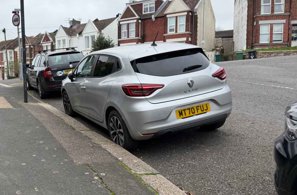 Photograph of MT70 FUJ - a Silver Renault Clio parked in Hollingdean by a non-resident. The first of three photographs supplied by the residents of Hollingdean.