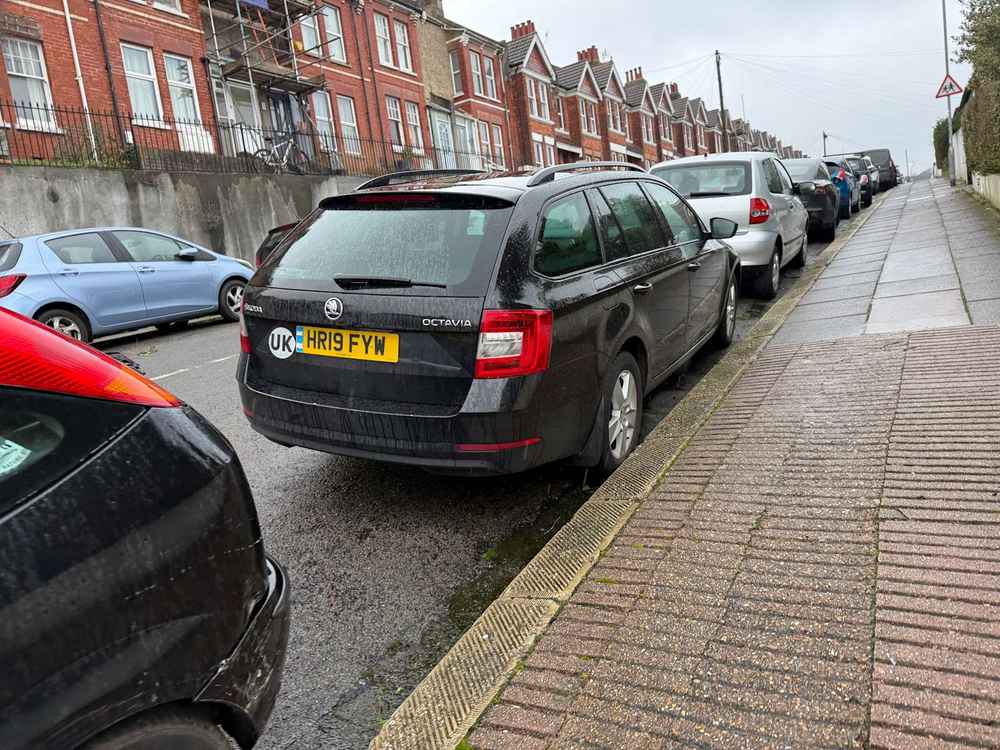 Photograph of HR19 FYW - a Black Skoda Octavia parked in Hollingdean by a non-resident. The eleventh of eleven photographs supplied by the residents of Hollingdean.