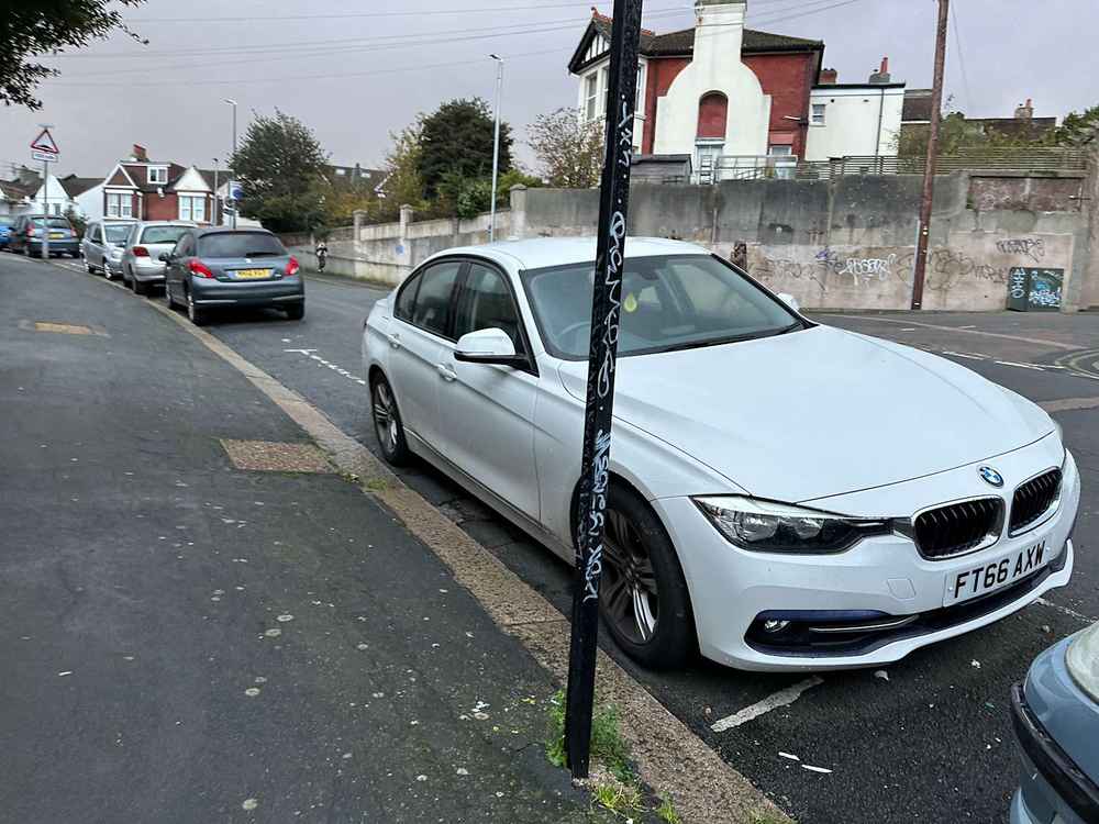 Photograph of FT66 AXW - a White BMW 3 Series parked in Hollingdean by a non-resident who uses the local area as part of their Brighton commute. The sixth of twenty-five photographs supplied by the residents of Hollingdean.