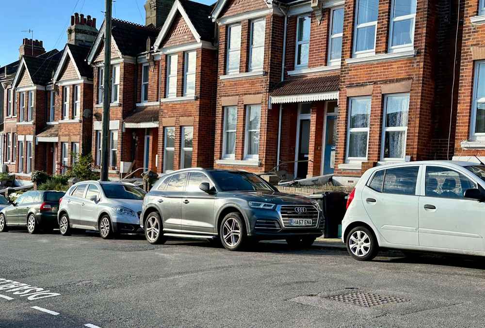 Photograph of HA57 ENA - a Grey Audi Q5 parked in Hollingdean by a non-resident who uses the local area as part of their Brighton commute. The first of ten photographs supplied by the residents of Hollingdean.