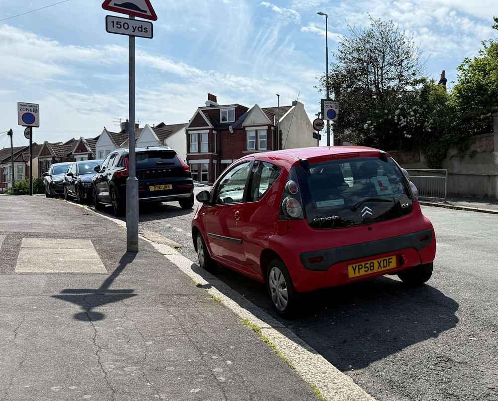 Photograph of YP58 XDF - a Red Citroen C1 parked in Hollingdean by a non-resident, and potentially abandoned. The twelfth of twenty photographs supplied by the residents of Hollingdean.