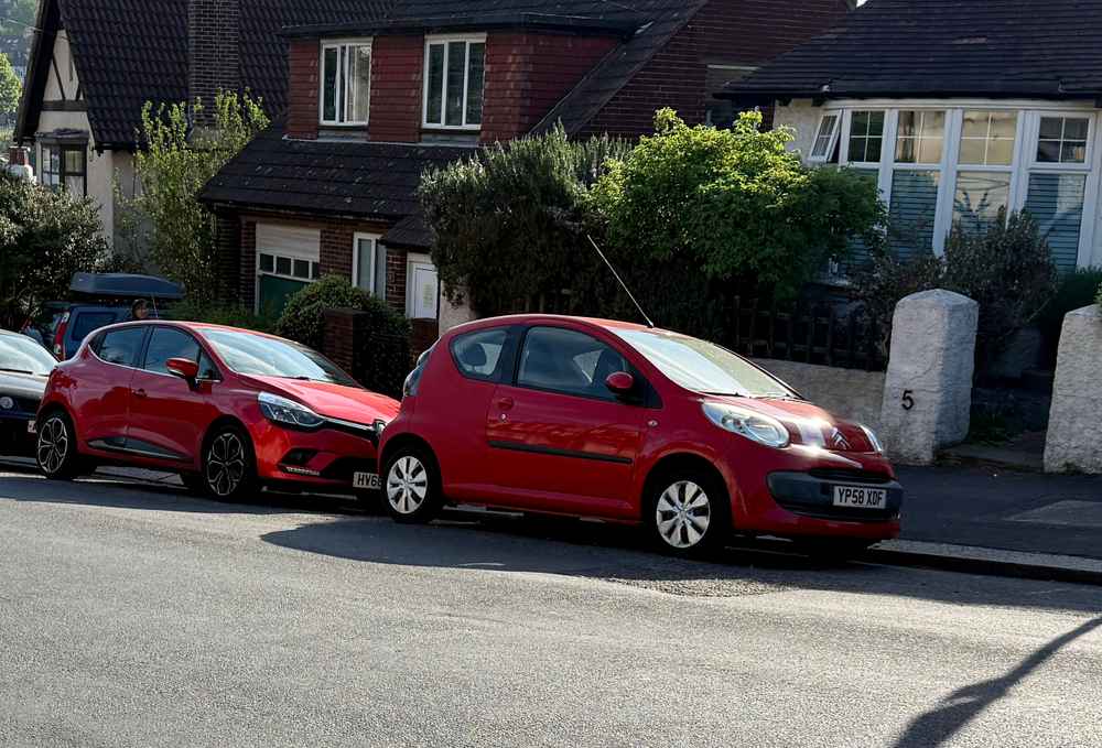 Photograph of YP58 XDF - a Red Citroen C1 parked in Hollingdean by a non-resident, and potentially abandoned. The eleventh of eleven photographs supplied by the residents of Hollingdean.