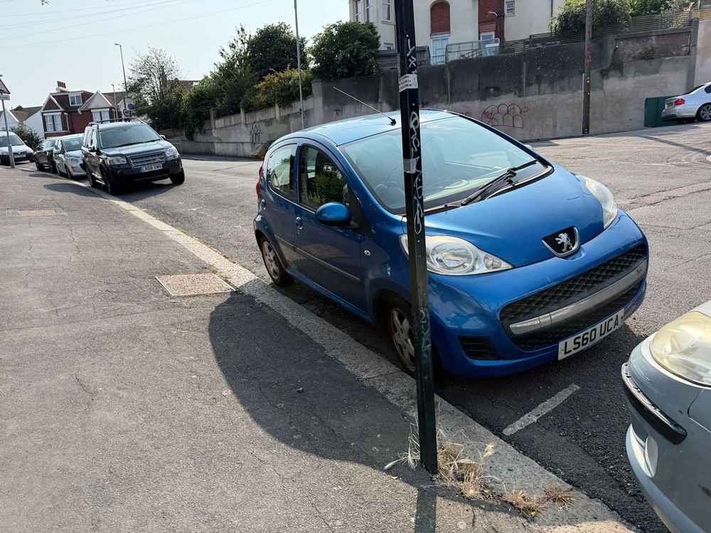 Photograph of LS60 UCA - a Blue Peugeot 107 parked in Hollingdean by a non-resident. The twenty-second of thirty photographs supplied by the residents of Hollingdean.