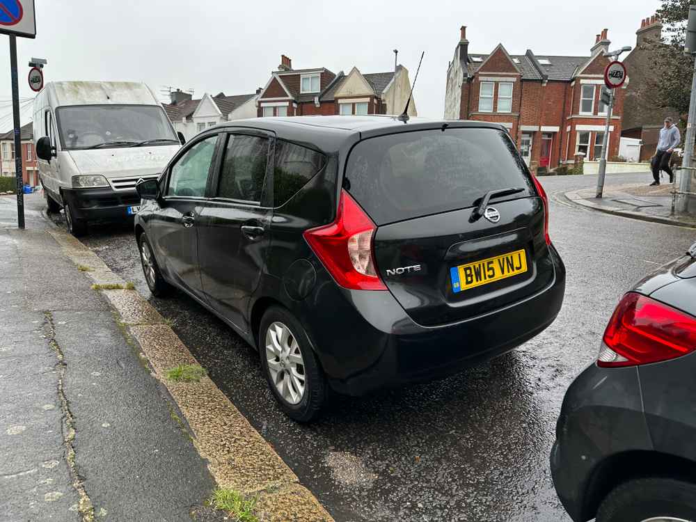 Photograph of BW15 VNJ - a Black Nissan Note parked in Hollingdean by a non-resident who uses the local area as part of their Brighton commute. The fifteenth of twenty photographs supplied by the residents of Hollingdean.