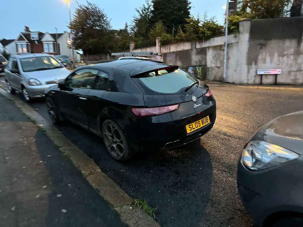 Photograph of SL09 WUB - a Black Alfa Romeo Brera parked in Hollingdean by a non-resident. The thirteenth of forty-four photographs supplied by the residents of Hollingdean.
