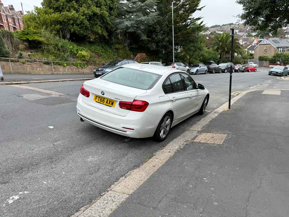 Photograph of FT66 AXW - a White BMW 3 Series parked in Hollingdean by a non-resident who uses the local area as part of their Brighton commute. The nineteenth of nineteen photographs supplied by the residents of Hollingdean.