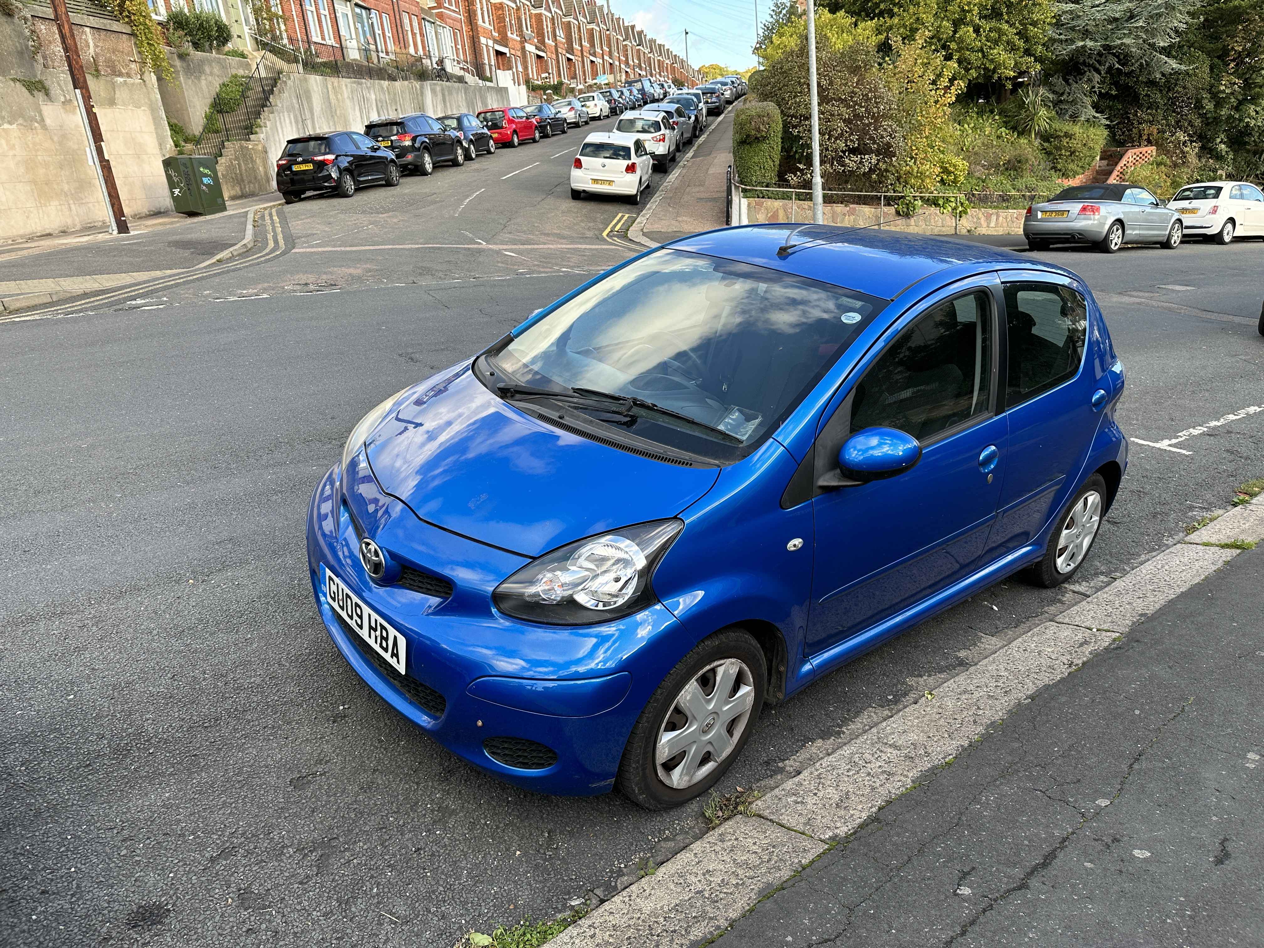 Photograph of GU09 HBA - a Blue Toyota Aygo parked in Hollingdean by a non-resident who uses the local area as part of their Brighton commute. The second of four photographs supplied by the residents of Hollingdean.