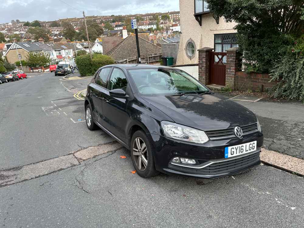 Photograph of GY16 LGG - a Black Volkswagen Polo parked in Hollingdean by a non-resident. The third of ten photographs supplied by the residents of Hollingdean.