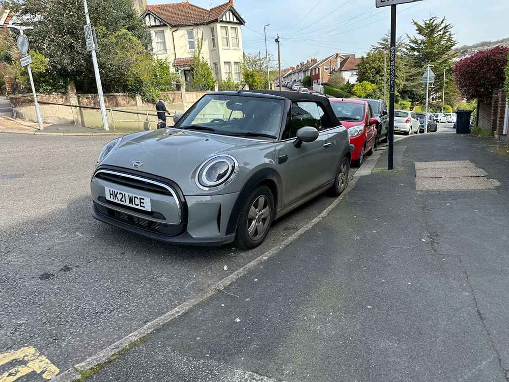 Photograph of HK21 WCE - a Grey Mini Cooper parked in Hollingdean by a non-resident. The first of two photographs supplied by the residents of Hollingdean.