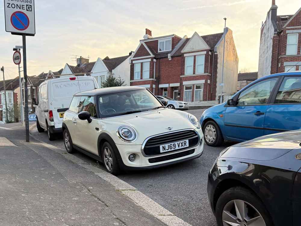 Photograph of NJ69 VXR - a Beige Mini Cooper parked in Hollingdean by a non-resident. The seventh of ten photographs supplied by the residents of Hollingdean.