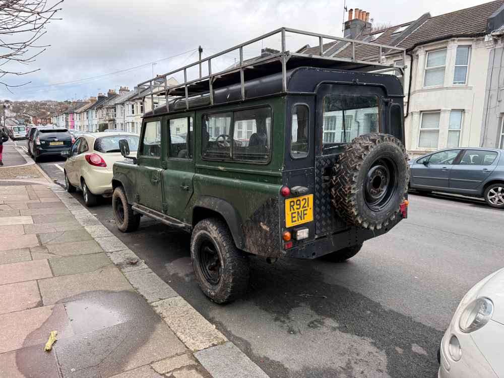 Photograph of R921 ENF - a Green Land Rover Defender parked in Hollingdean by a non-resident. The seventh of seven photographs supplied by the residents of Hollingdean.