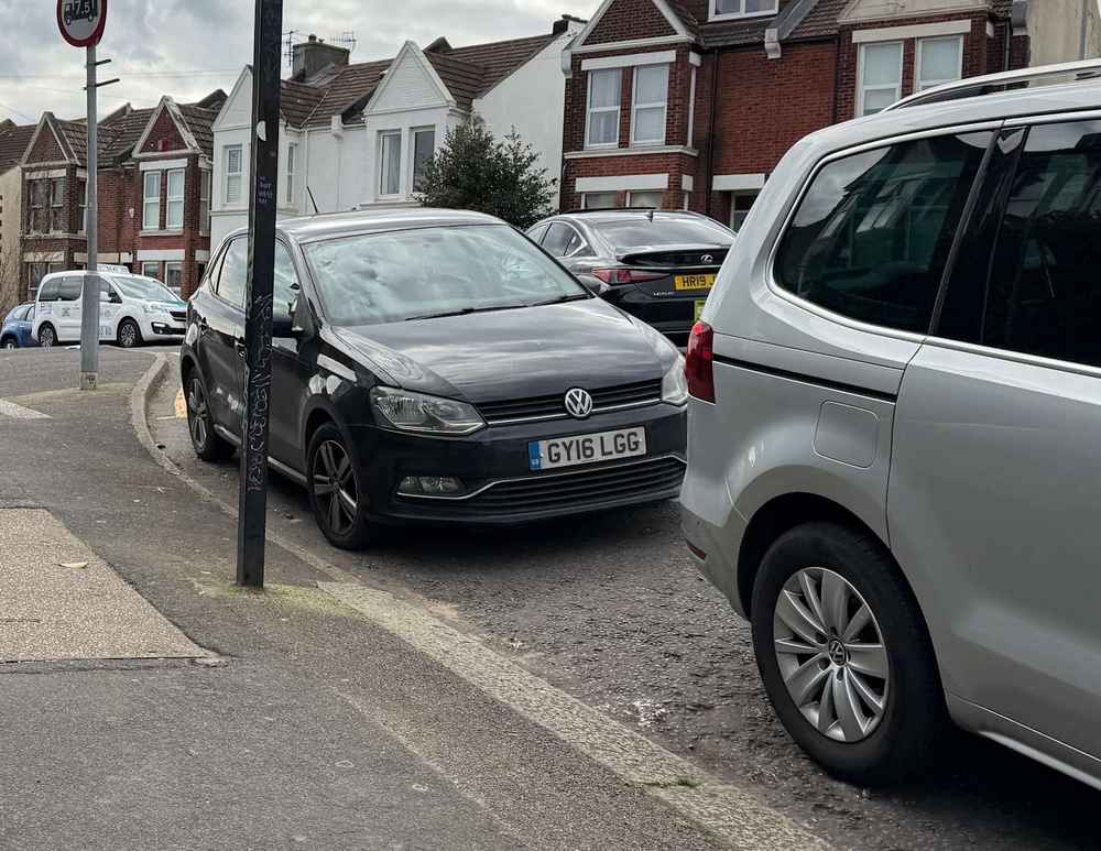 Photograph of GY16 LGG - a Black Volkswagen Polo parked in Hollingdean by a non-resident. The twelfth of fourteen photographs supplied by the residents of Hollingdean.