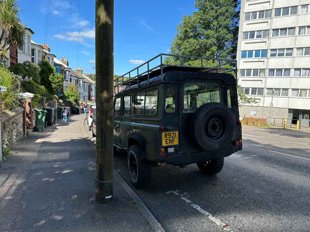 Photograph of R921 ENF - a Green Land Rover Defender parked in Hollingdean by a non-resident. The sixth of six photographs supplied by the residents of Hollingdean.