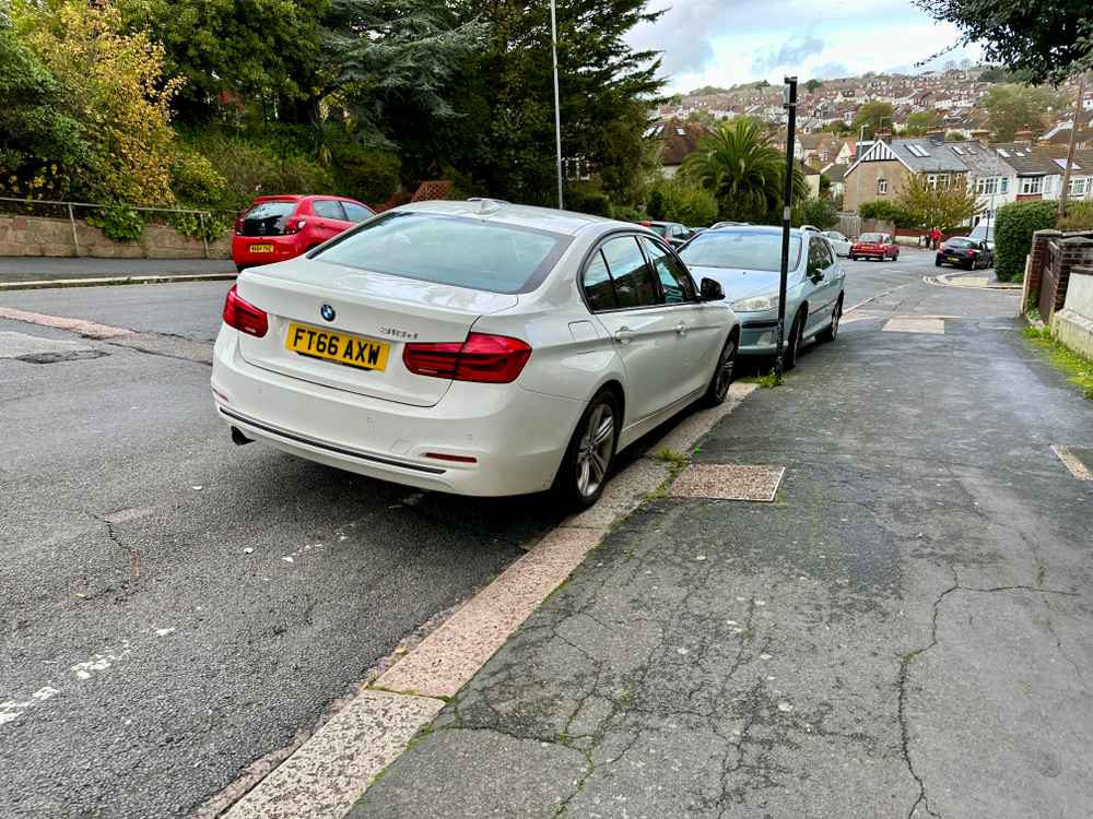 Photograph of FT66 AXW - a White BMW 3 Series parked in Hollingdean by a non-resident who uses the local area as part of their Brighton commute. The third of nine photographs supplied by the residents of Hollingdean.