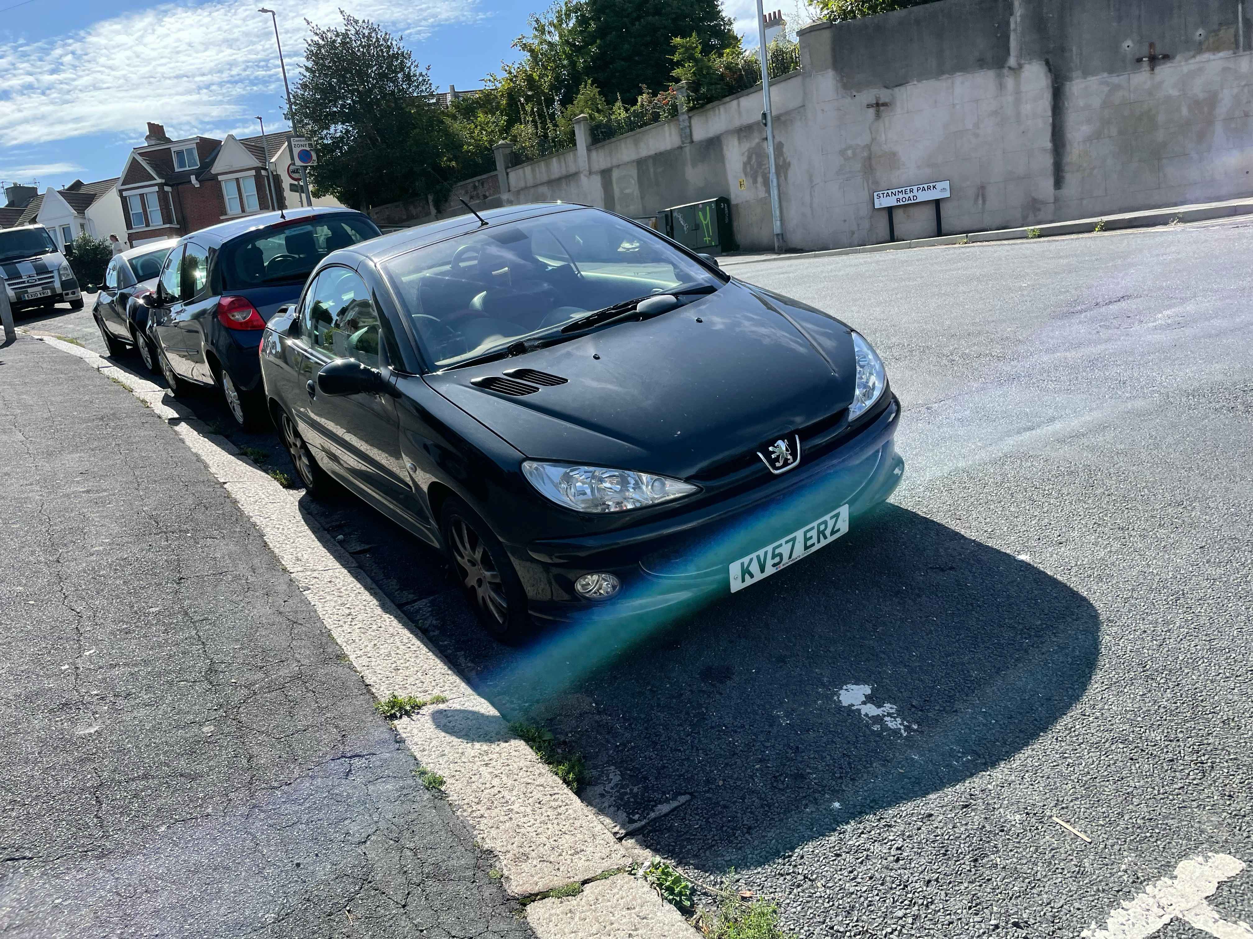 Photograph of KV57 ERZ - a Black Peugeot 206 parked in Hollingdean by a non-resident. The fourth of eight photographs supplied by the residents of Hollingdean.