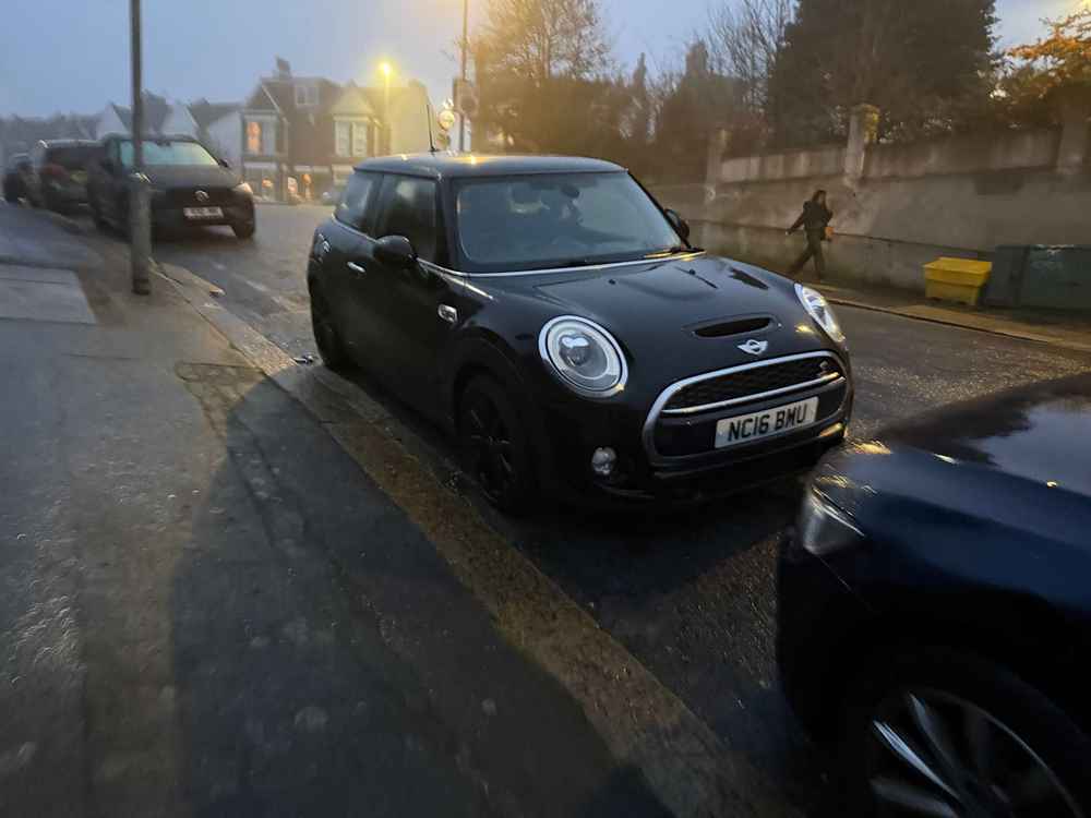 Photograph of NC16 BMU - a Black Mini Cooper parked in Hollingdean by a non-resident who uses the local area as part of their Brighton commute. The fourteenth of fifteen photographs supplied by the residents of Hollingdean.