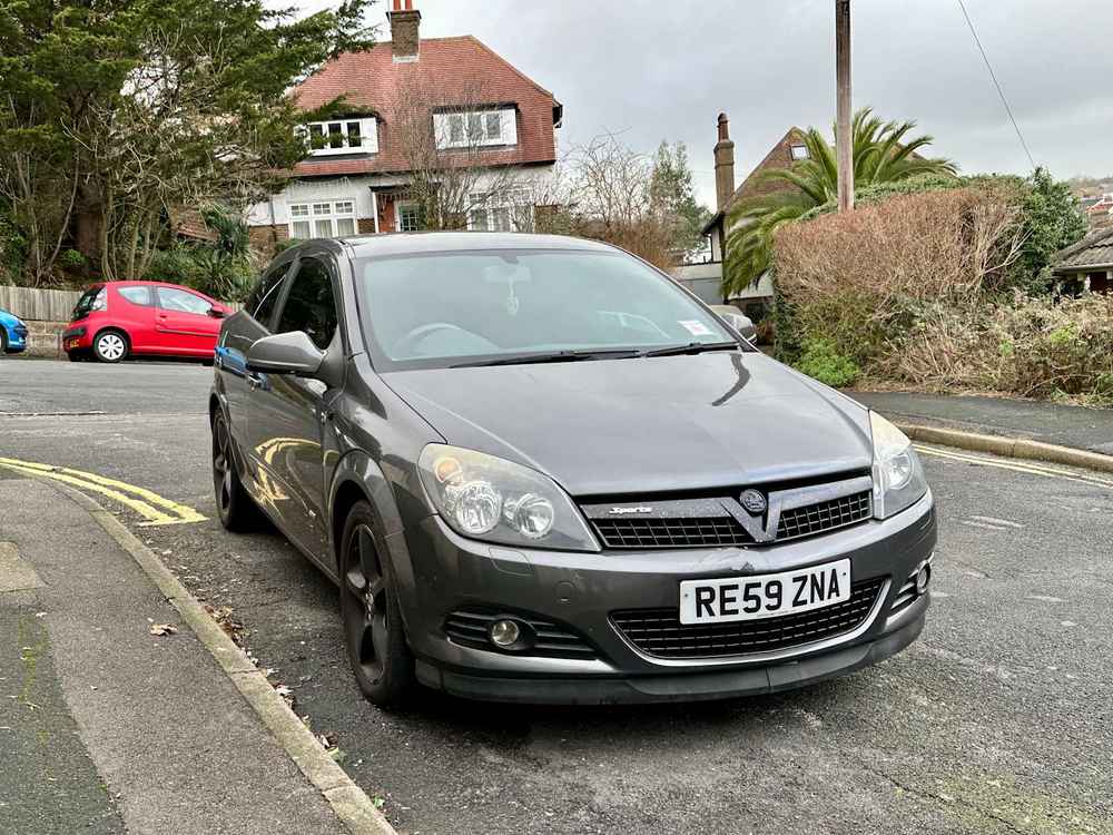 Photograph of RE59 ZNA - a Grey Vauxhall Astra parked in Hollingdean by a non-resident. The fourth of twenty-four photographs supplied by the residents of Hollingdean.