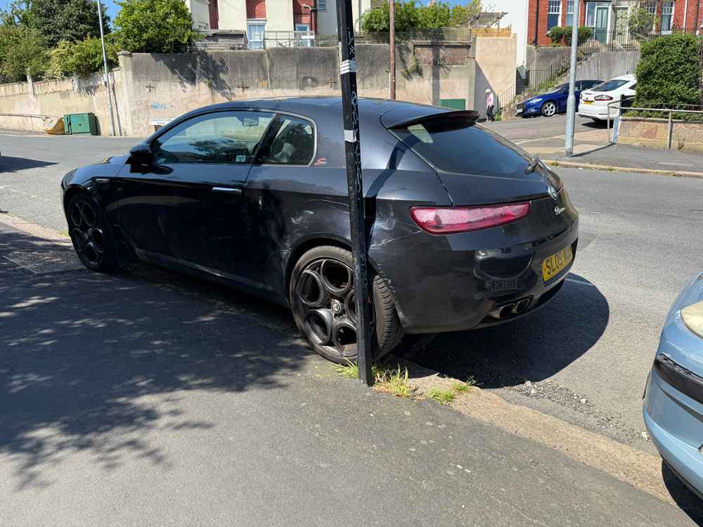 Photograph of SL09 WUB - a Black Alfa Romeo Brera parked in Hollingdean by a non-resident. The thirty-first of thirty-five photographs supplied by the residents of Hollingdean.