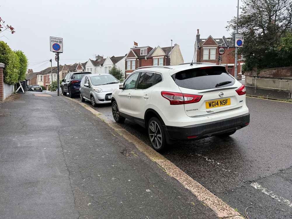 Photograph of WG14 NSF - a White Nissan Qashqai parked in Hollingdean by a non-resident who uses the local area as part of their Brighton commute. The eighth of twelve photographs supplied by the residents of Hollingdean.