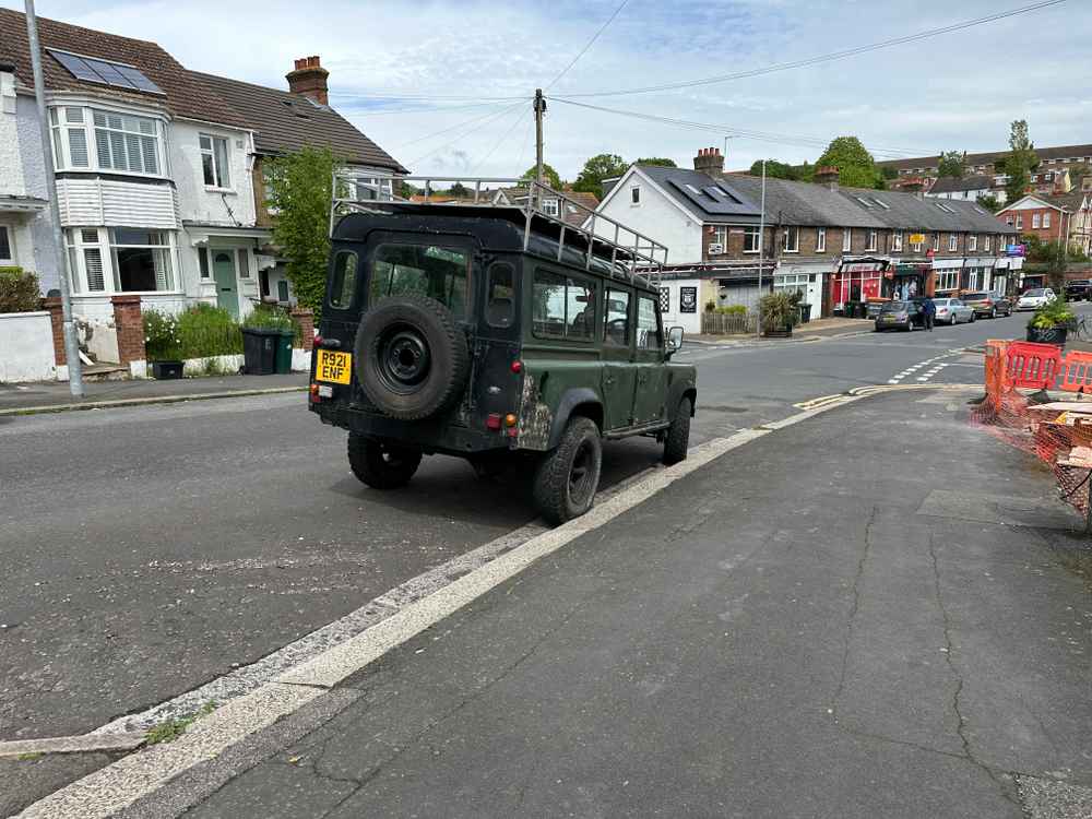 Photograph of R921 ENF - a Green Land Rover Defender parked in Hollingdean by a non-resident. The fifth of six photographs supplied by the residents of Hollingdean.