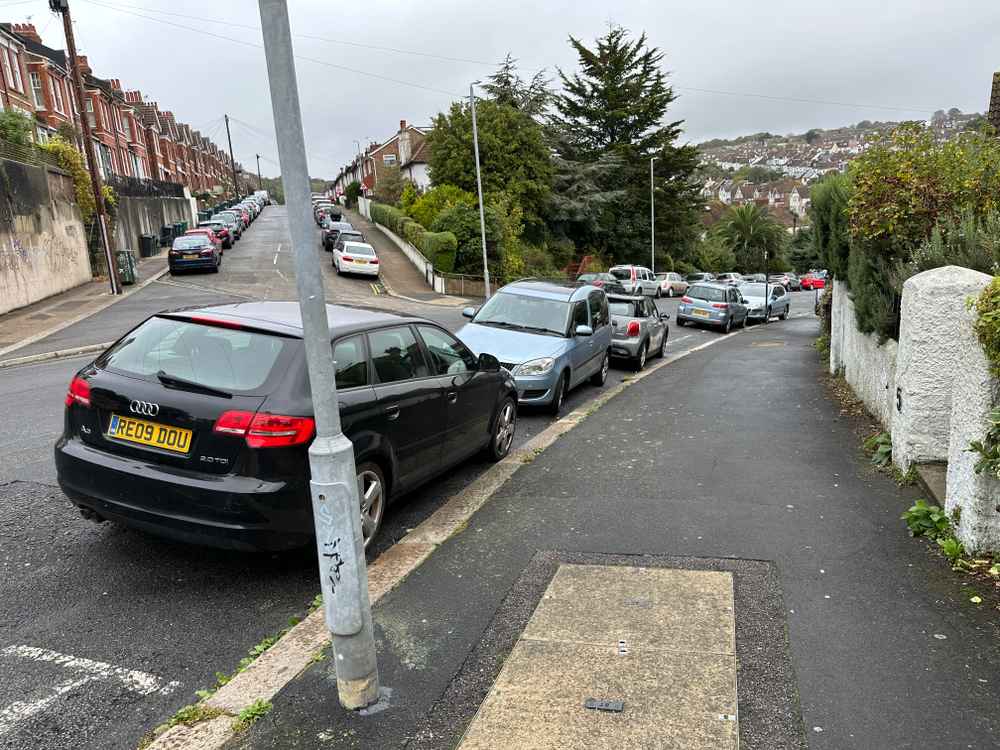 Photograph of RE09 DOU - a Black Audi A3 parked in Hollingdean by a non-resident who uses the local area as part of their Brighton commute. The third of eight photographs supplied by the residents of Hollingdean.