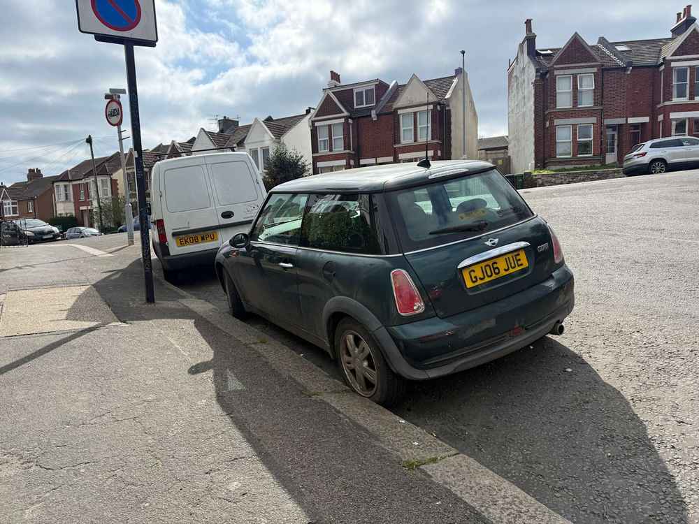 Photograph of GJ06 JUE - a Green Mini Cooper parked in Hollingdean by a non-resident. The twenty-first of twenty-four photographs supplied by the residents of Hollingdean.