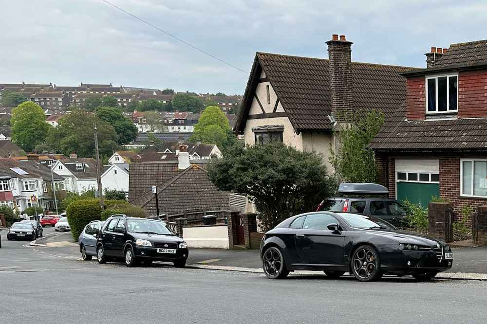 Photograph of SL09 WUB - a Black Alfa Romeo Brera parked in Hollingdean by a non-resident. The twentieth of forty-four photographs supplied by the residents of Hollingdean.