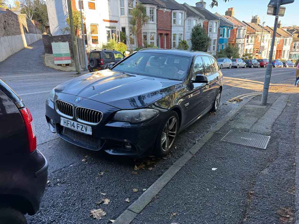 Photograph of HF14 FZV - a Black BMW 5 Series parked in Hollingdean by a non-resident, and potentially abandoned. The fourth of four photographs supplied by the residents of Hollingdean.