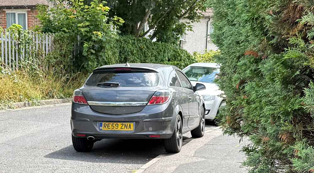 Photograph of RE59 ZNA - a Grey Vauxhall Astra parked in Hollingdean by a non-resident. The seventeenth of seventeen photographs supplied by the residents of Hollingdean.