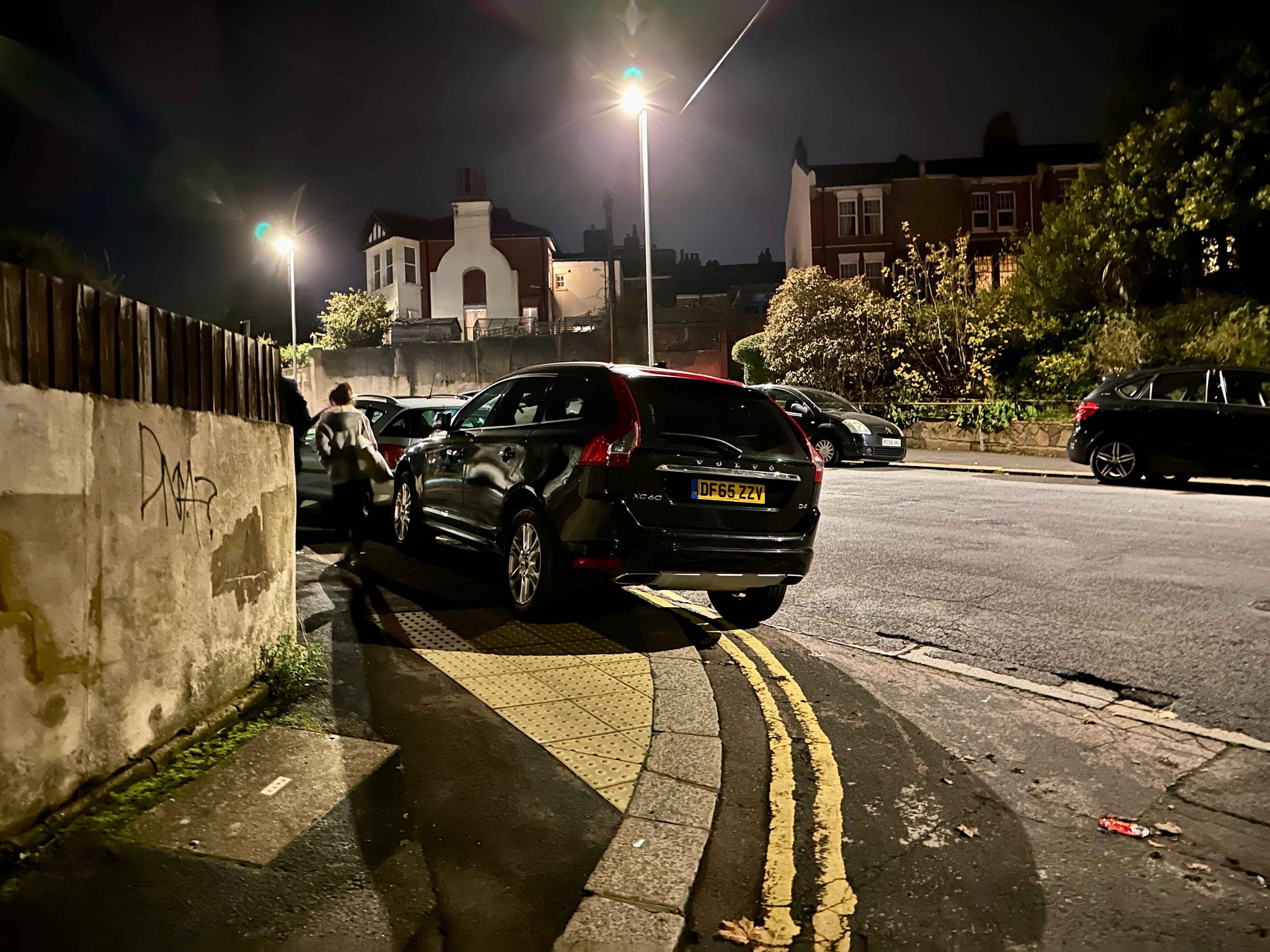 Photograph of DF65 ZZV - a Black Volvo XC60 parked in Hollingdean by a non-resident. The first of eight photographs supplied by the residents of Hollingdean.