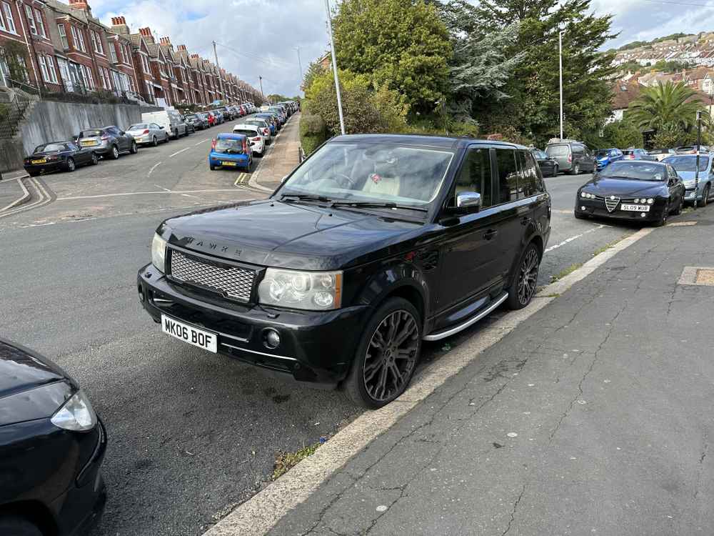 Photograph of MK06 BOF - a Black Land Rover Ranger Rover parked in Hollingdean by a non-resident. The third of four photographs supplied by the residents of Hollingdean.