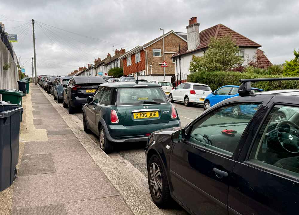 Photograph of GJ06 JUE - a Green Mini Cooper parked in Hollingdean by a non-resident. The seventeenth of seventeen photographs supplied by the residents of Hollingdean.