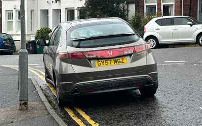 GY57 MGZ, a Gold Honda Civic parked in Hollingdean