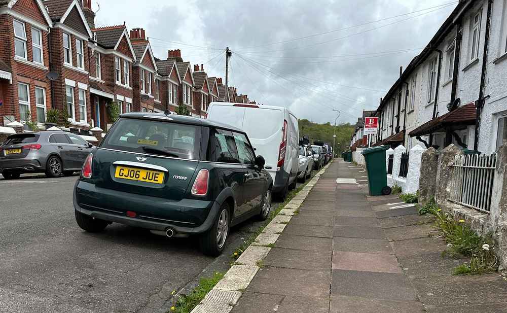 Photograph of GJ06 JUE - a Green Mini Cooper parked in Hollingdean by a non-resident. The tenth of twenty-four photographs supplied by the residents of Hollingdean.