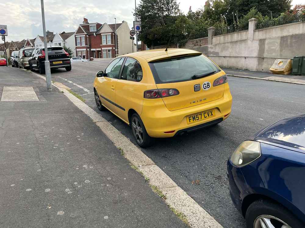 Photograph of FM57 CVX - a Yellow Seat Ibiza parked in Hollingdean by a non-resident. The second of two photographs supplied by the residents of Hollingdean.