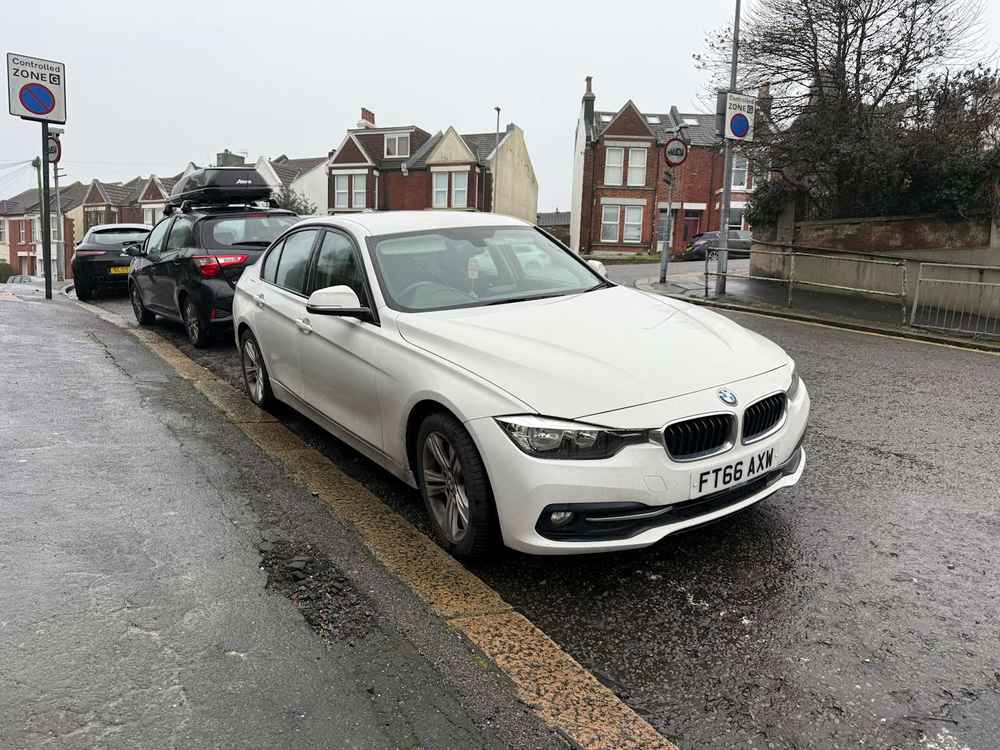 Photograph of FT66 AXW - a White BMW 3 Series parked in Hollingdean by a non-resident who uses the local area as part of their Brighton commute. The twenty-sixth of twenty-six photographs supplied by the residents of Hollingdean.