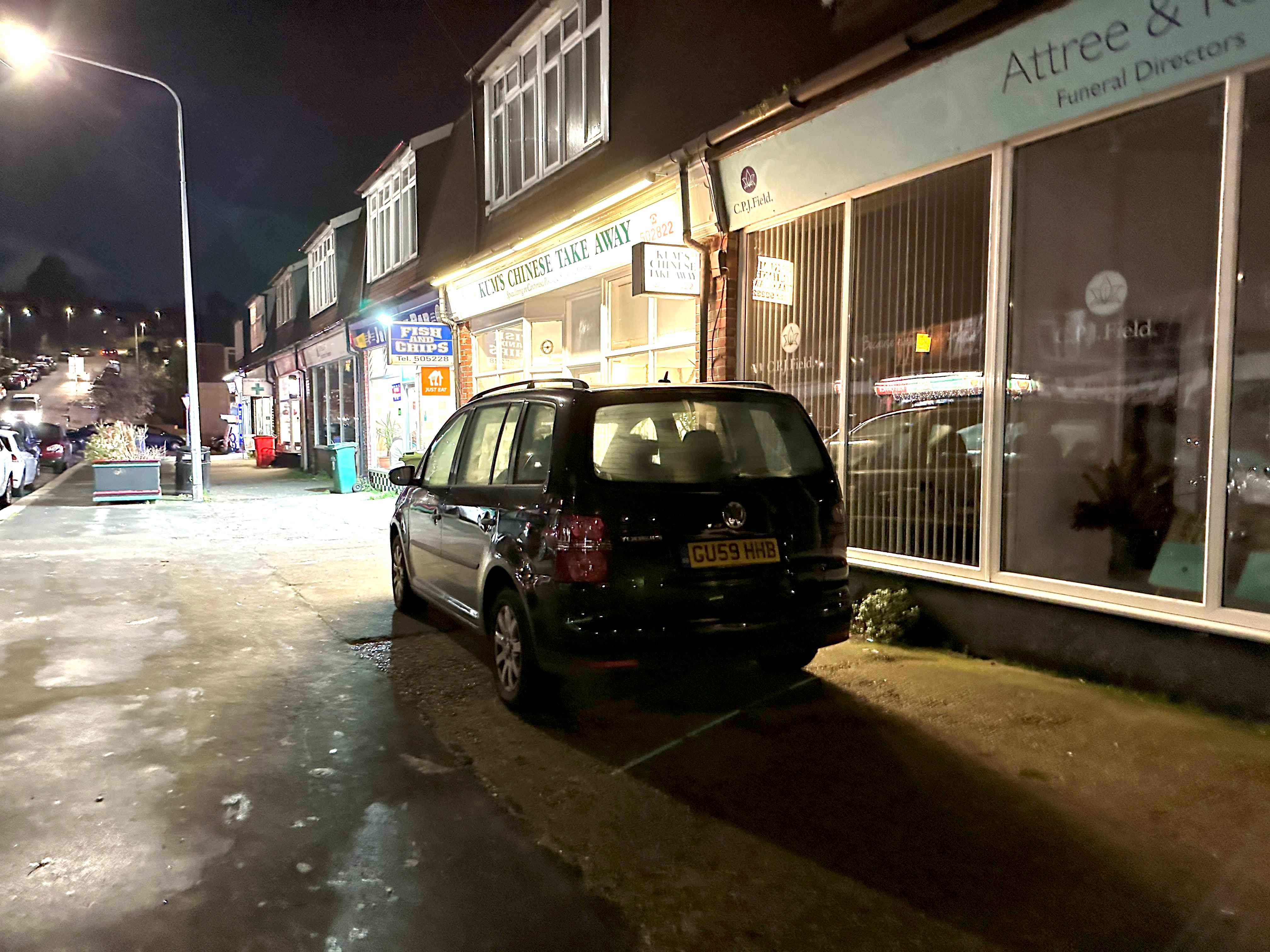 Photograph of GU59 HHB - a Black Volkswagen Touran parked in Hollingdean by a non-resident. The first of two photographs supplied by the residents of Hollingdean.