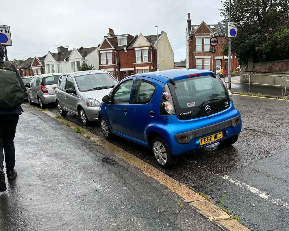 Photograph of FE60 WEC - a Blue Citroen C1 parked in Hollingdean by a non-resident. The first of sixteen photographs supplied by the residents of Hollingdean.