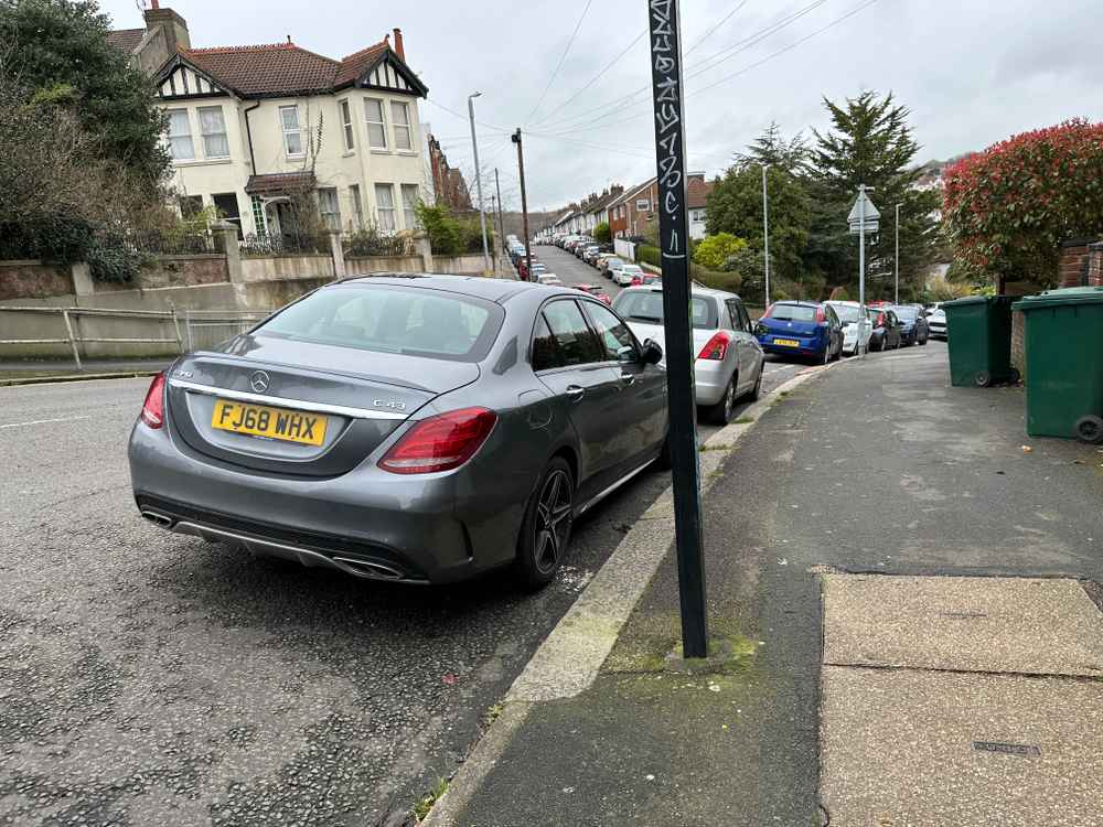 Photograph of FJ68 WHX - a Grey Mercedes C Class parked in Hollingdean by a non-resident. The third of eight photographs supplied by the residents of Hollingdean.