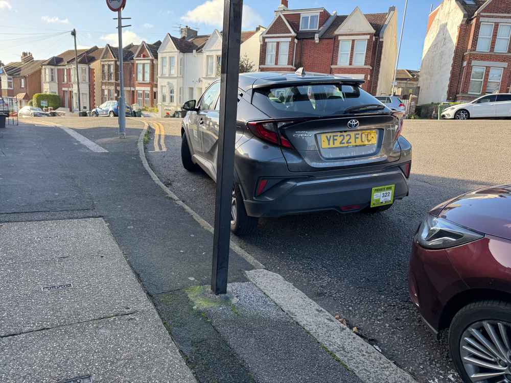 Photograph of YF22 FOC - a Grey Toyota C-HR taxi parked in Hollingdean by a non-resident. The second of seven photographs supplied by the residents of Hollingdean.